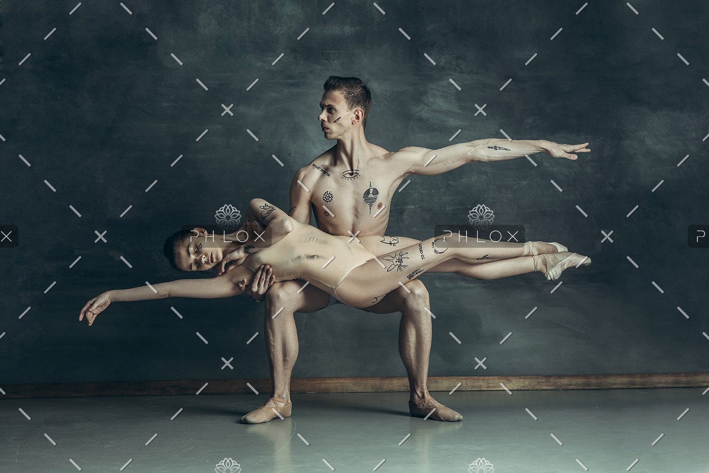 demo-attachment-84-the-young-modern-ballet-dancers-posing-on-gray-JYBC7XQ